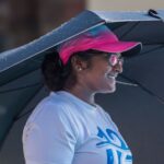 Darshi, CEO of Swimin12 guiding neurodivergent children on how to swim