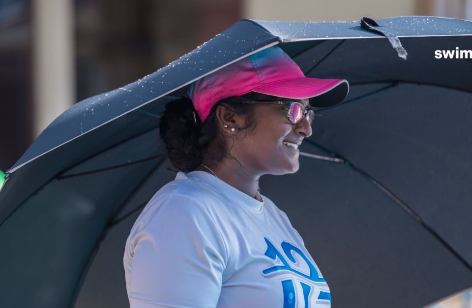 Darshi, CEO of Swimin12 guiding neurodivergent children on how to swim
