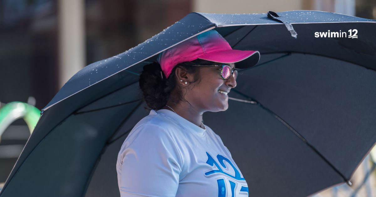 Darshi, CEO of Swimin12 guiding neurodivergent children on how to swim